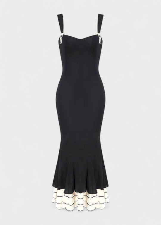 Vestido largo ajustado negro con escote corazón y tirantes finos