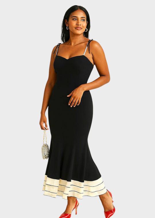 Vestido largo ajustado negro con escote corazón y tirantes finos